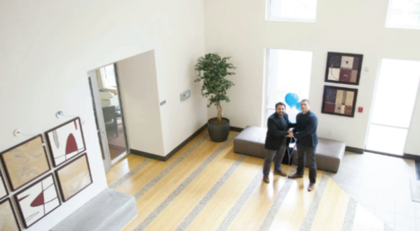 Overhead view of a spacious and modern office lobby.